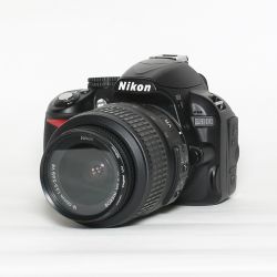 Nikon D3100 + 18-55